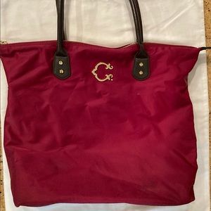 C. Wonder burgundy vinyl tote